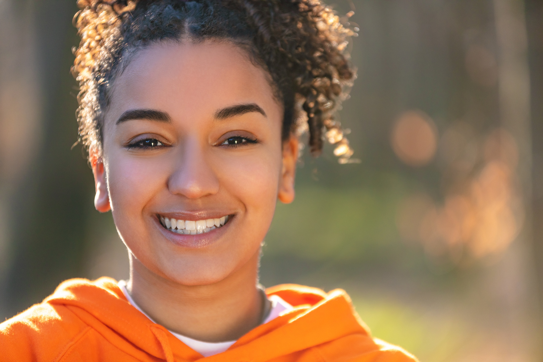 Portrait of Smiling Person Outdoors